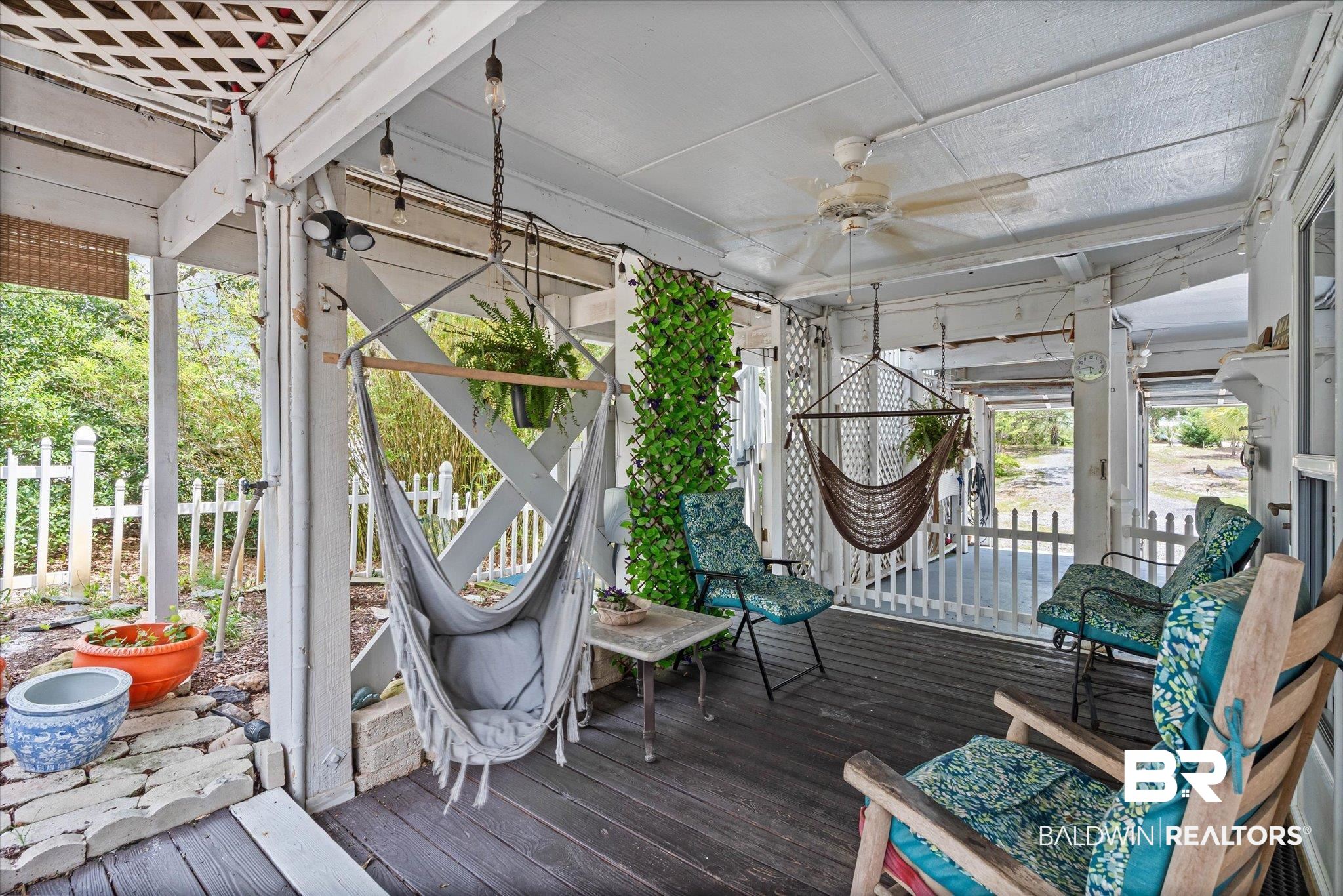 33129 River Road Orange Beach, AL 36561 - Photo 18 of 34 Deck with a ceiling fan