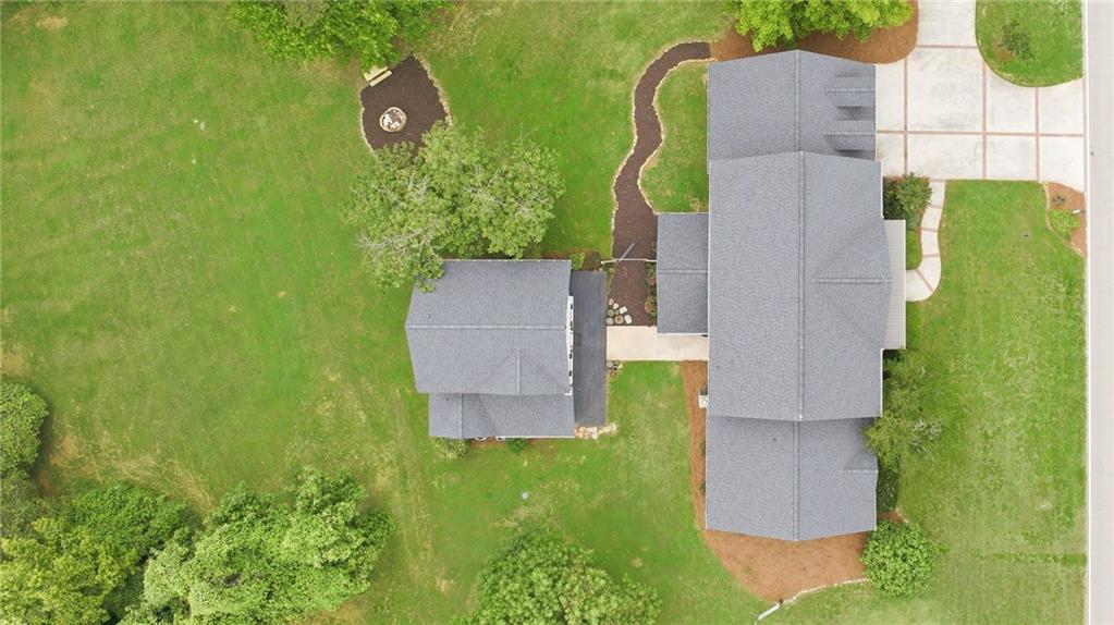 4337 Mountain View Road Oakwood, GA 30566 - Photo 71 of 84 an aerial view of a house with a garden and trees
