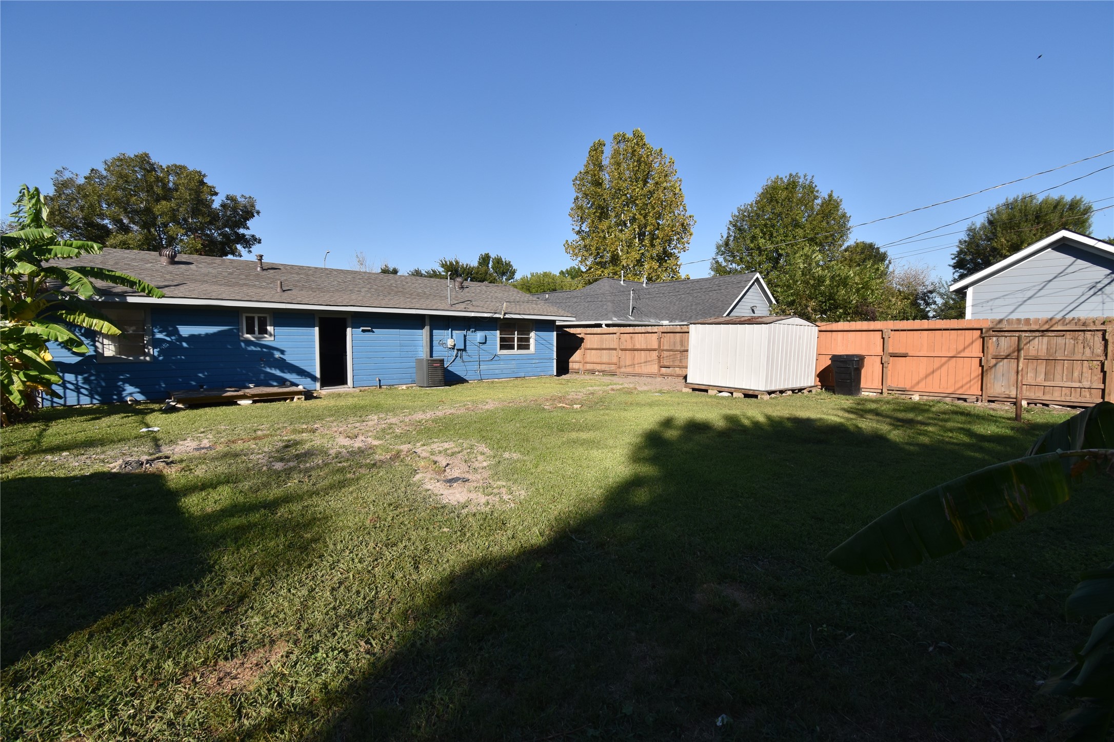 206 Arnett Lane Houston, TX 77037 - Photo 14 of 28 a view of a house with a yard