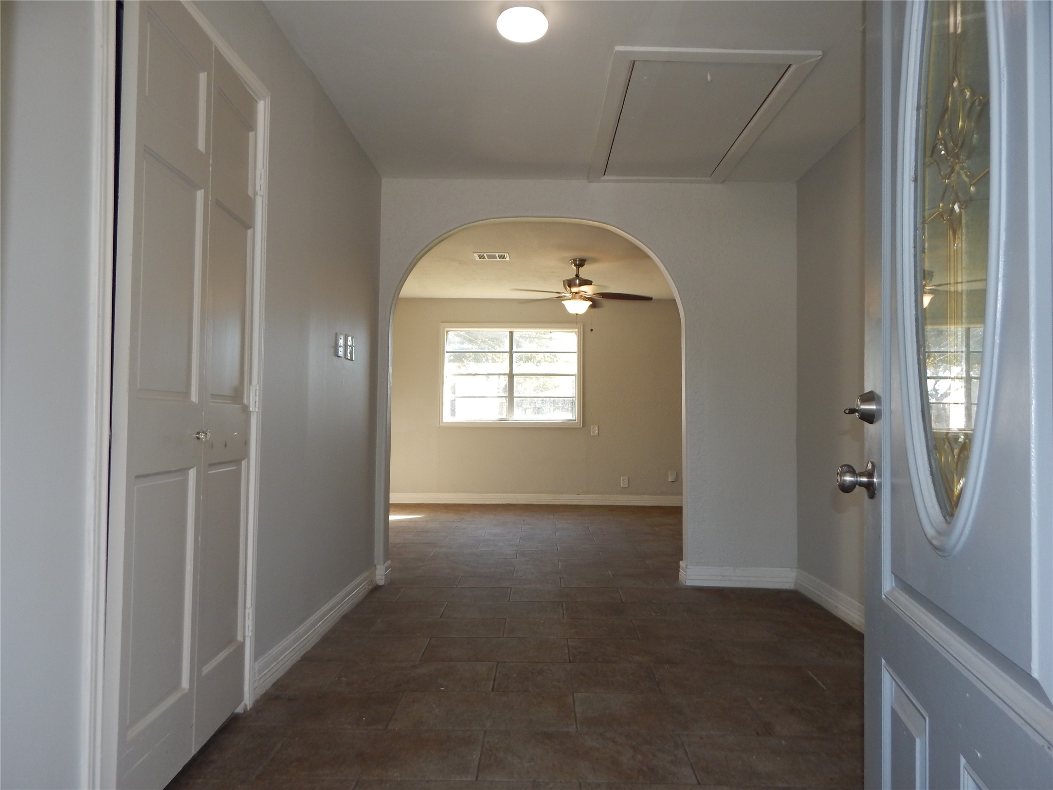 206 Arnett Lane Houston, TX 77037 - Photo 4 of 28 a view of empty room with windows