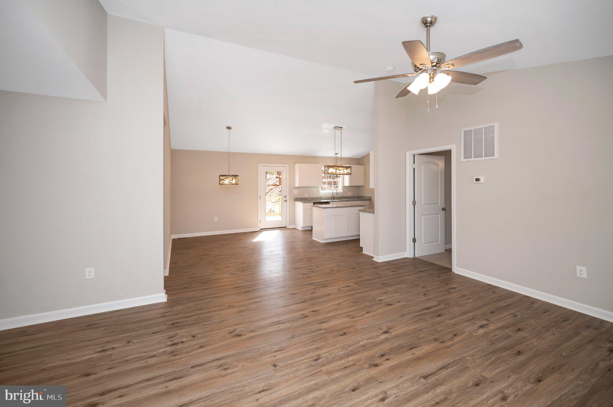 28150 Tatum Road Unionville, VA 22567 - Photo 3 of 28 Spacious, sunlit open living area.