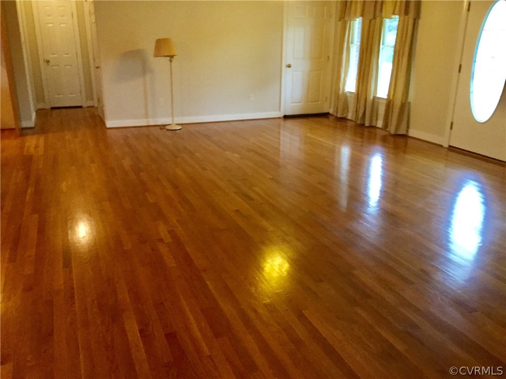 4361 Three Chopt Road Gum Spring, VA 23065 - Photo 17 of 49 a view of an empty room and wooden floor