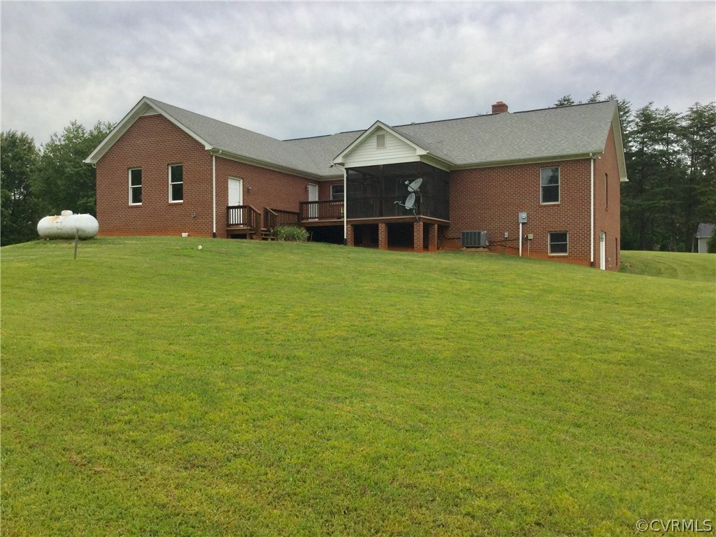 4361 Three Chopt Road Gum Spring, VA 23065 - Photo 24 of 49 a front view of a house with a garden