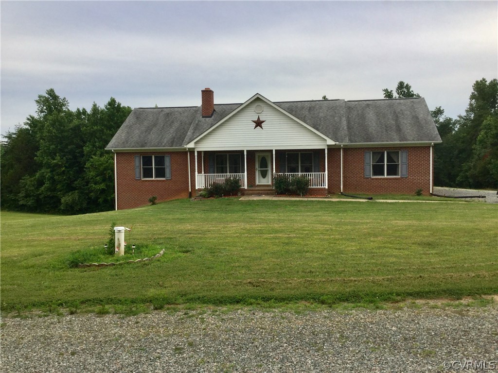 4361 Three Chopt Road Gum Spring, VA 23065 - Photo 4 of 49 a front view of a house with a yard