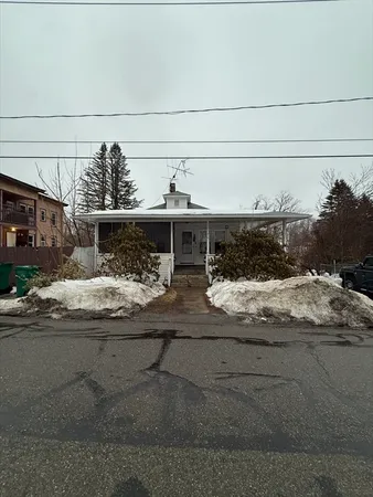 a kitchen with stainless steel appliances granite countertop a refrigerator a sink a stove a microwave and island