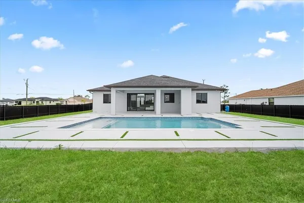 a house view with a backyard space