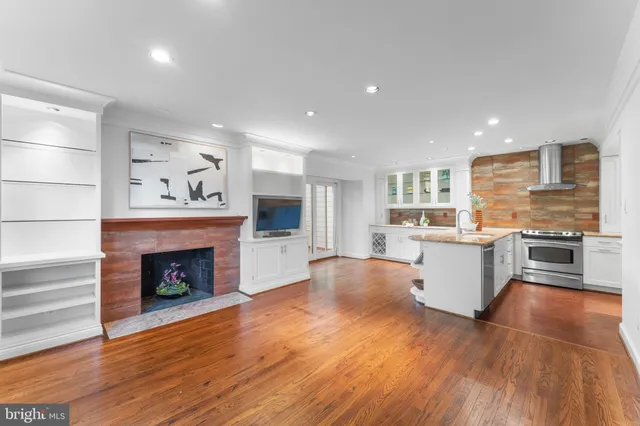a bathroom with a shower a toilet and sink
