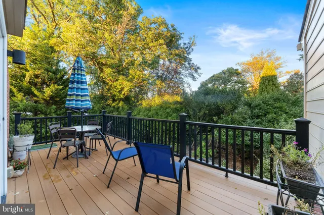 an empty room with a empty space and windows