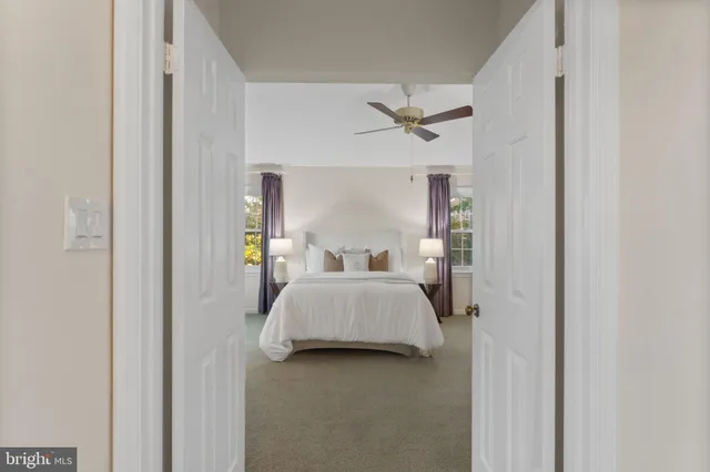 an empty room with a closet and cabinet