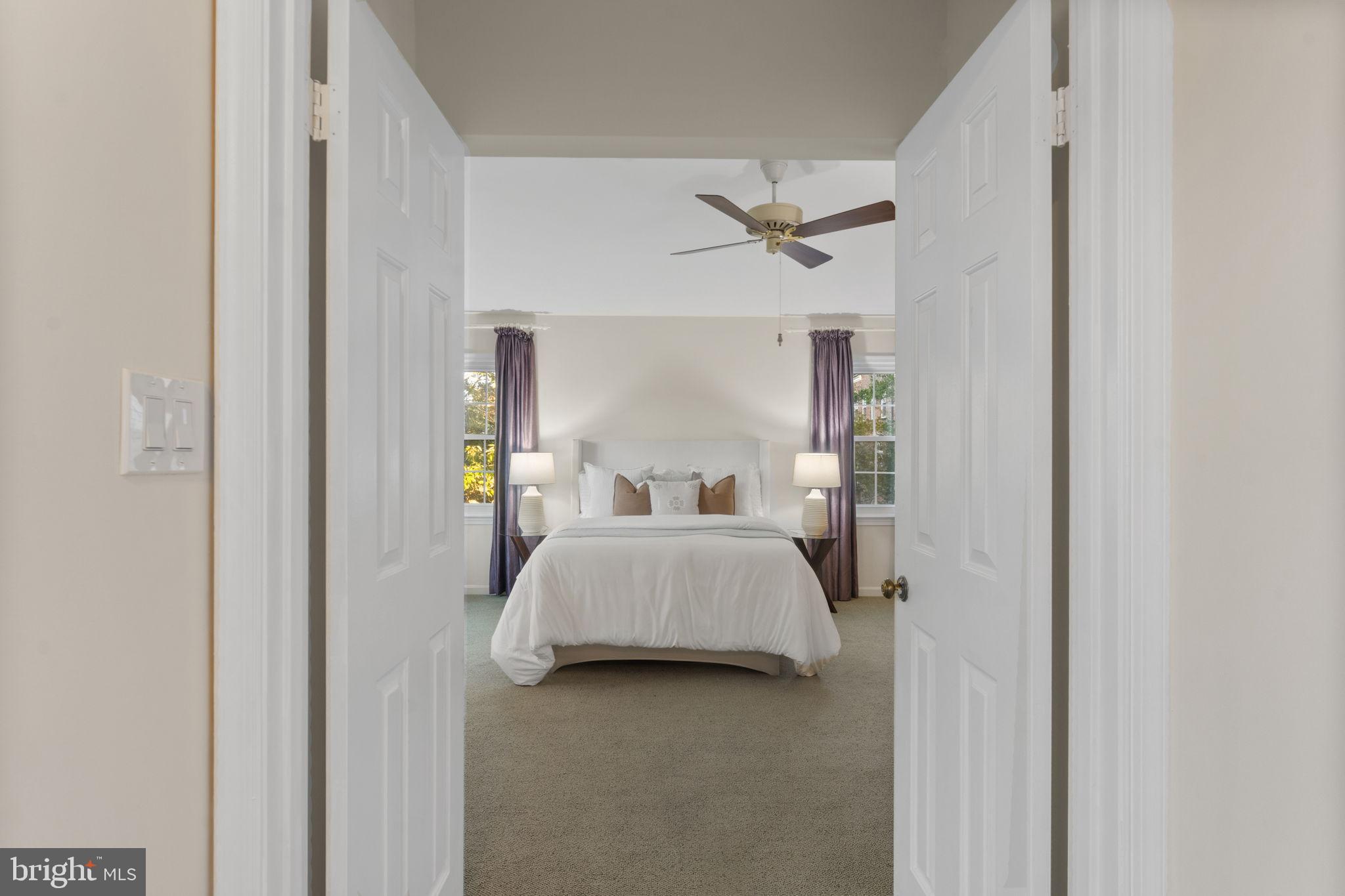 6619 Madison McLean Drive McLean, VA 22101 - Photo 17 of 54 a bed room with a bed and window