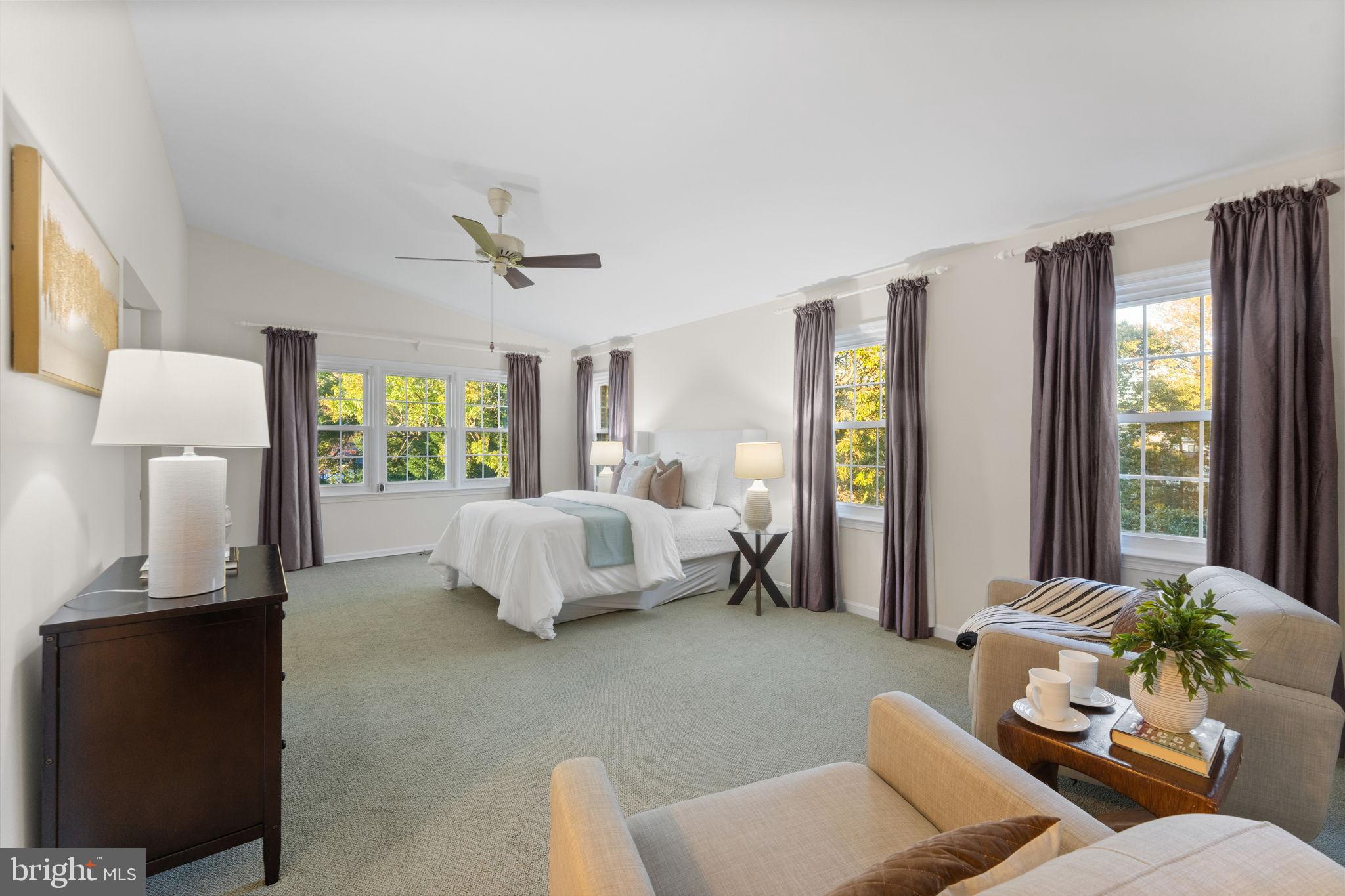 6619 Madison McLean Drive McLean, VA 22101 - Photo 19 of 54 a bedroom with a bed and a couch