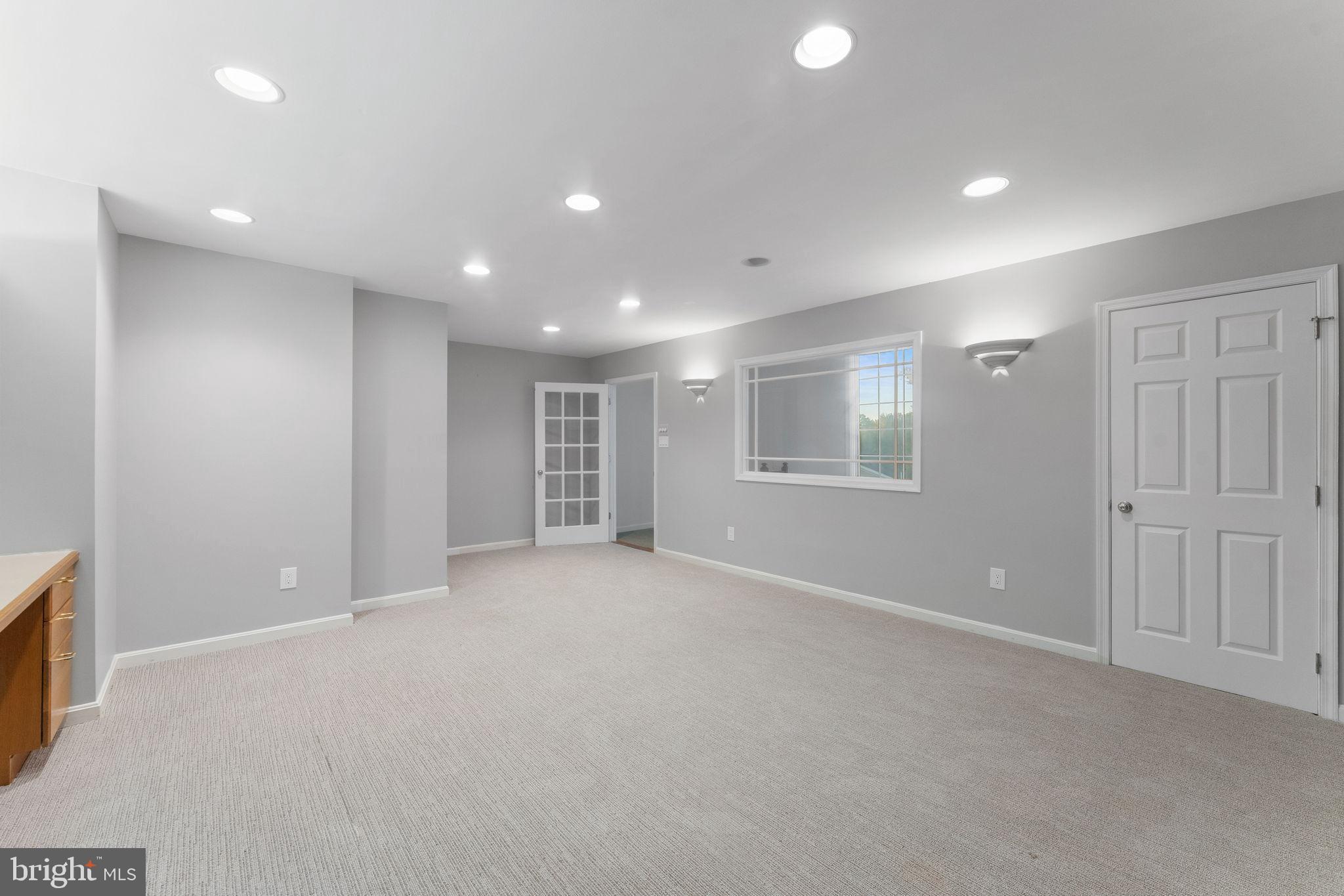 6619 Madison McLean Drive McLean, VA 22101 - Photo 34 of 54 an empty room with windows and closet