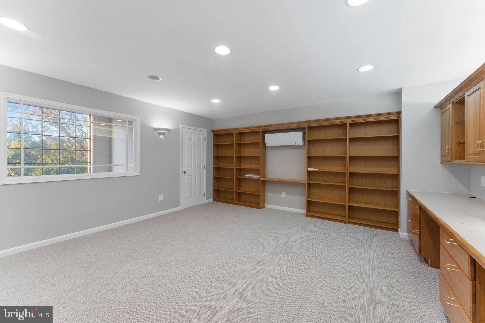 6619 Madison McLean Drive McLean, VA 22101 - Photo 36 of 54 a view of an empty room with a closet and a window