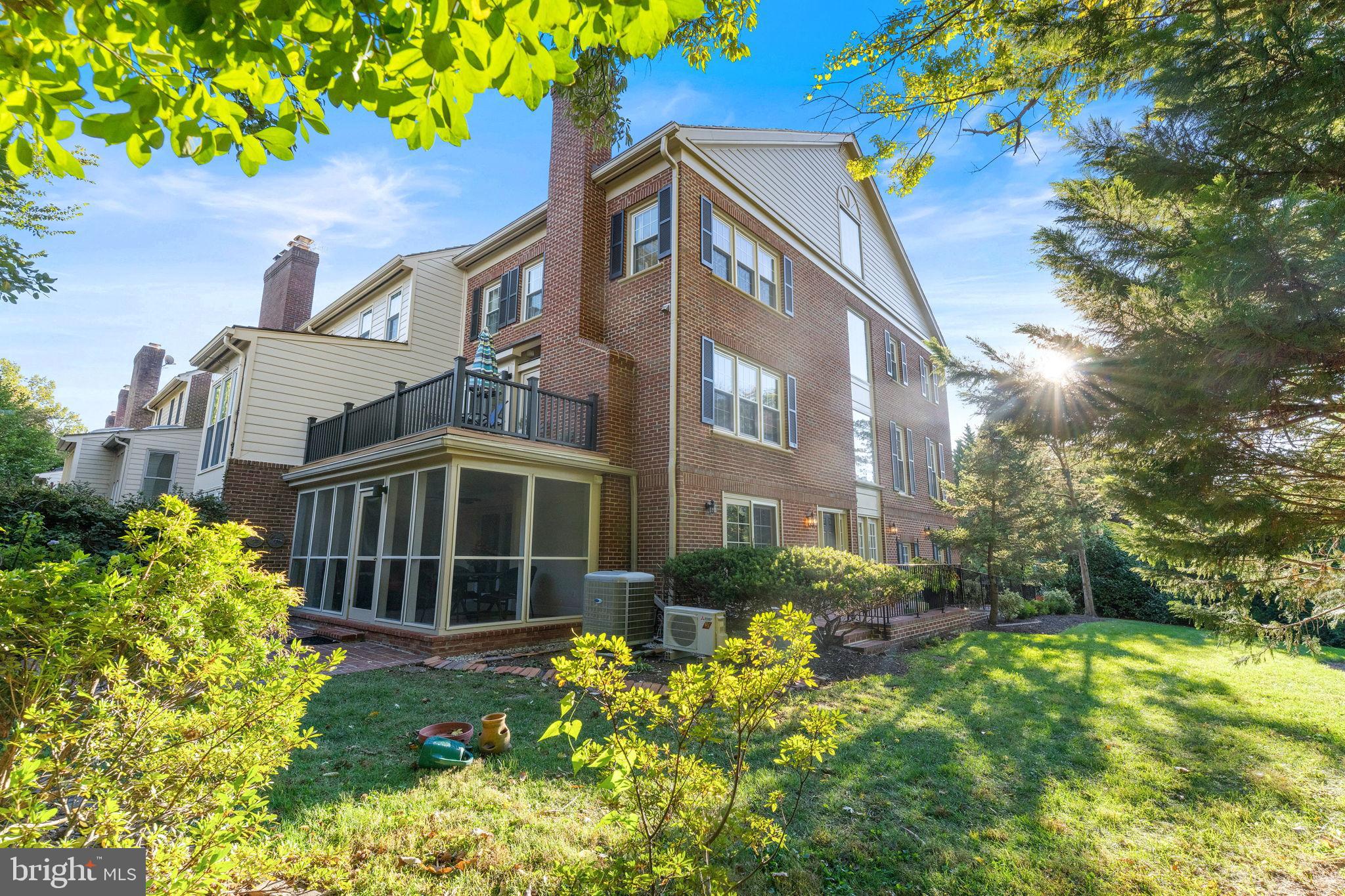 6619 Madison McLean Drive McLean, VA 22101 - Photo 45 of 54 a front view of a house with a yard
