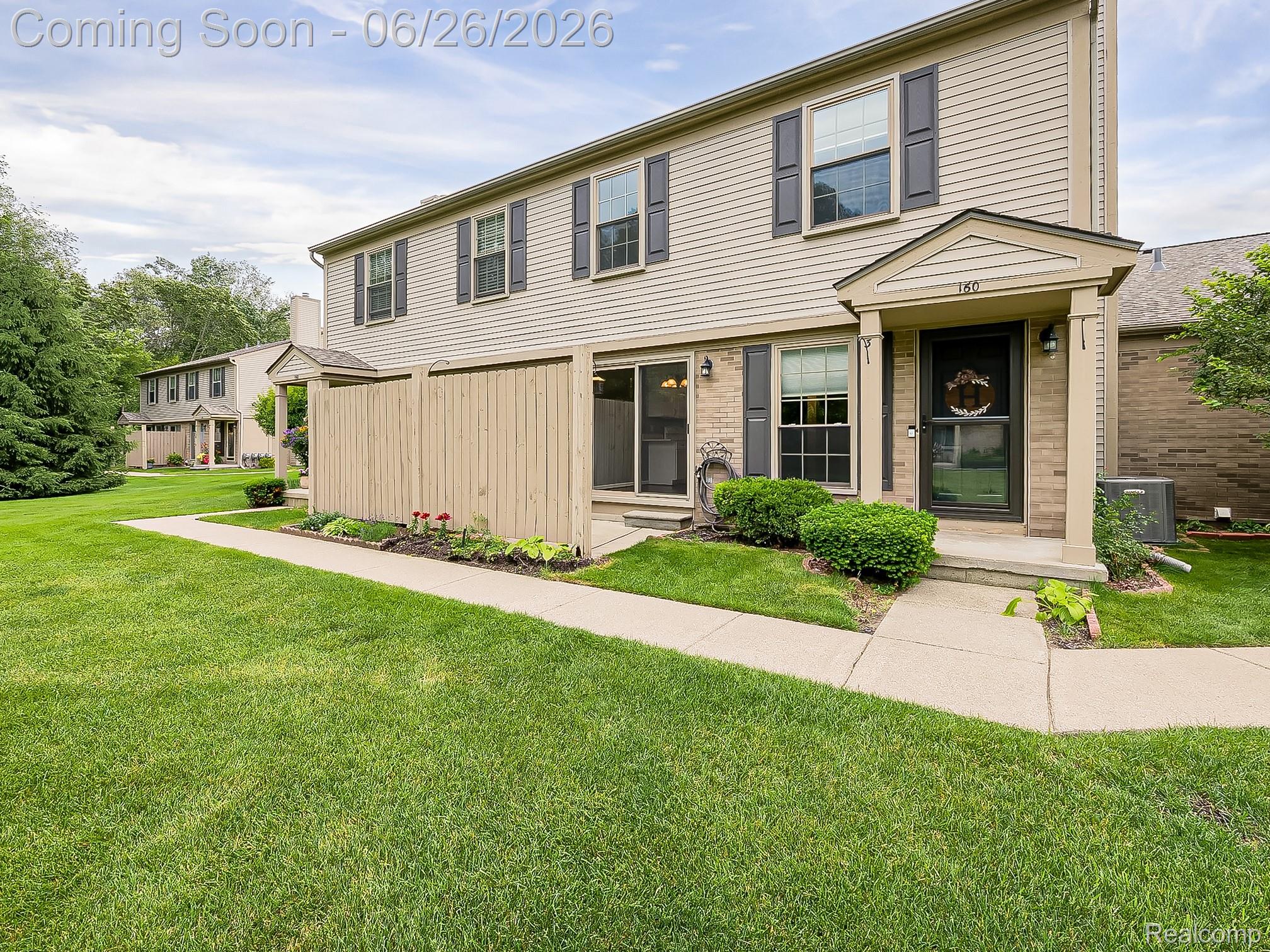 160 Pine Tree Ridge, Unit 3 Waterford, MI 48327 - Photo 1 of 26 Two-story residential building with light-colored siding and dark shutters