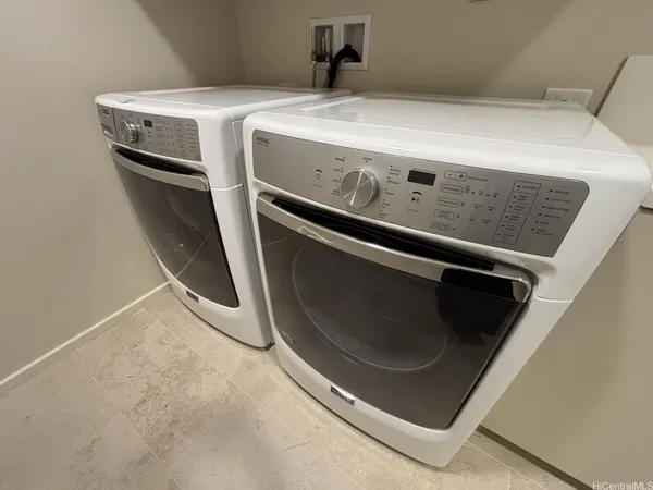a close up view of washer and dryer