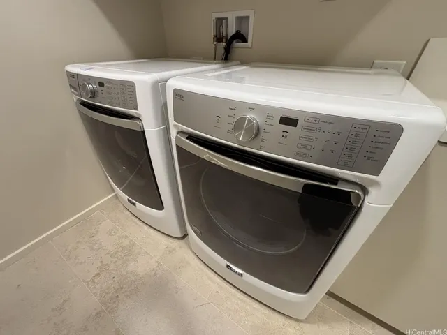 a close up view of washer and dryer