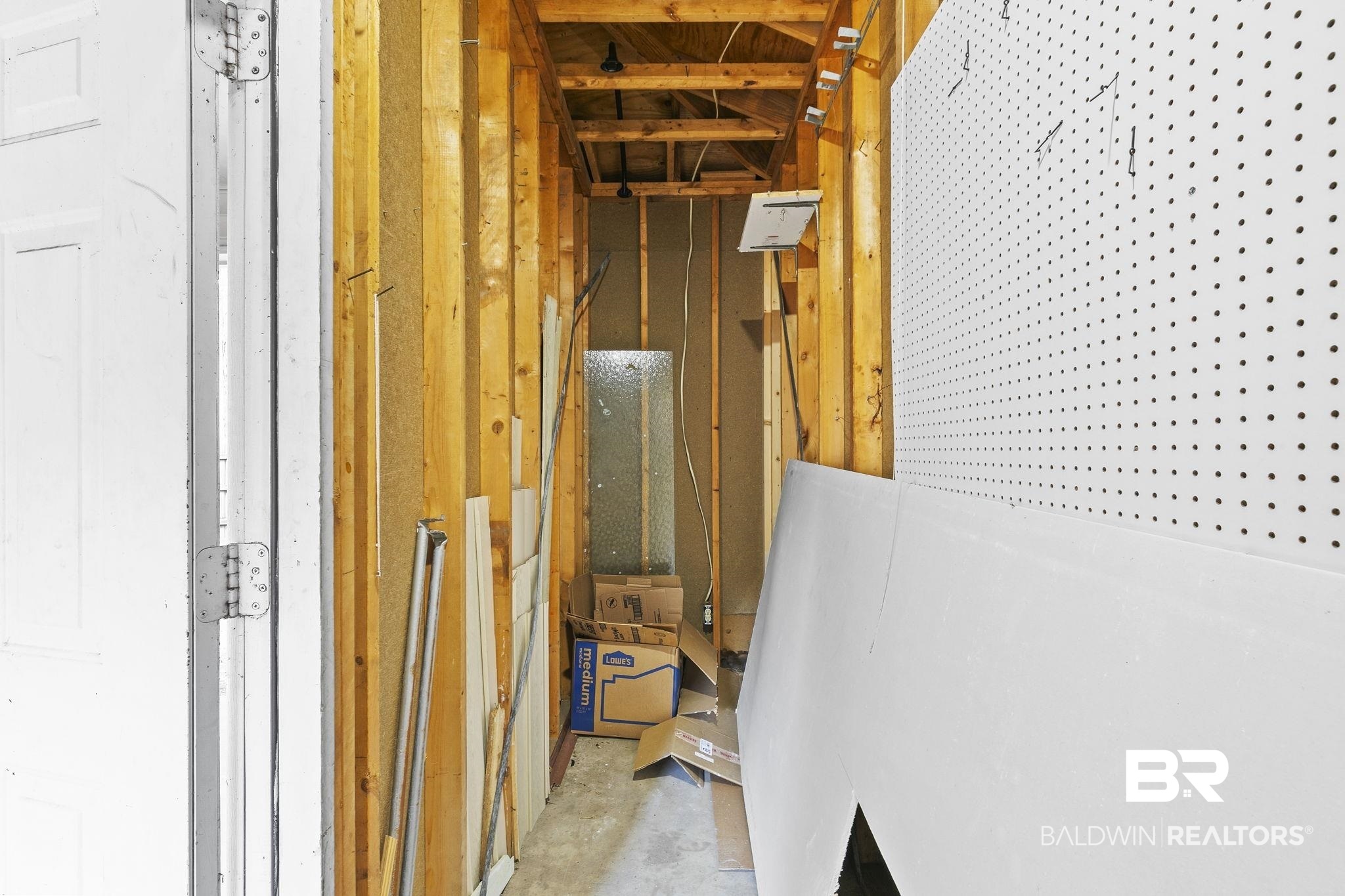474 Ridgewood Drive Daphne, AL 36526 - Photo 45 of 57 Corridor featuring concrete flooring