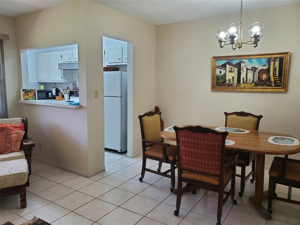 5300 Washington Street, Unit 114C Hollywood, FL 33021 - Photo 5 of 25 a view of a dining room with furniture