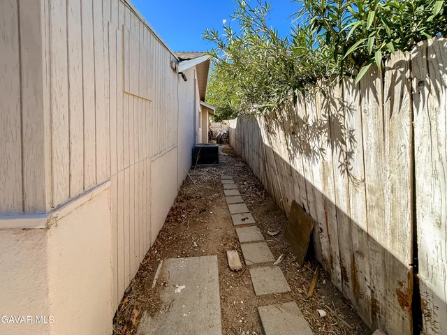 a view of a large window with wooden walls
