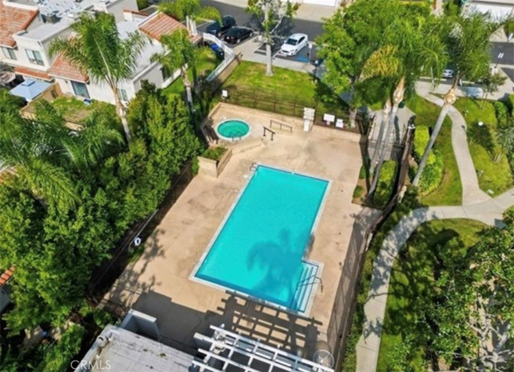 9713 La Jolla Drive, Unit B Rancho Cucamonga, CA 91701 - Photo 23 of 23 a view of a swimming pool with a yard