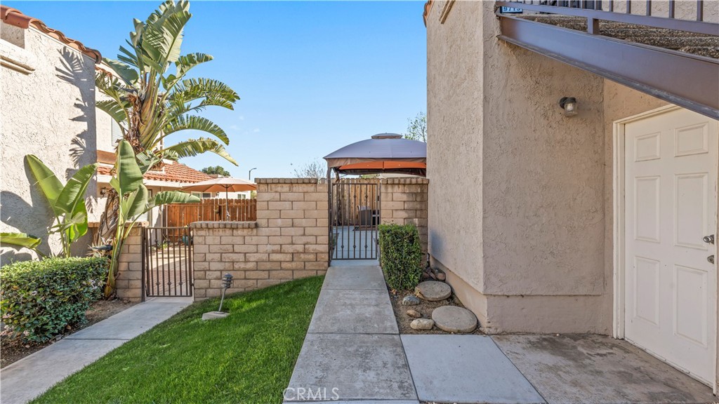 9713 La Jolla Drive, Unit B Rancho Cucamonga, CA 91701 - Photo 3 of 23 a view of a pathway with a pathway