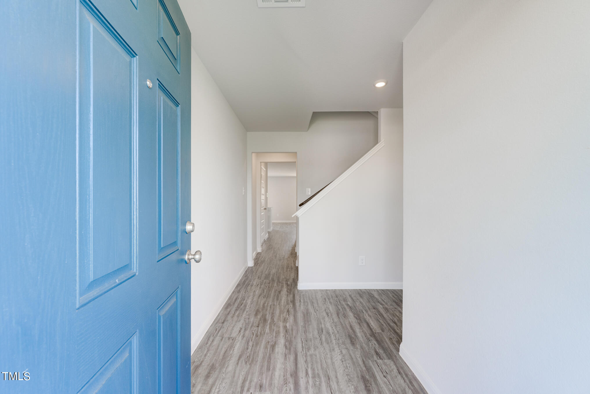 48 Andrea Court Roxboro, NC 27573 - Photo 16 of 36 a view of a hallway with wooden floor