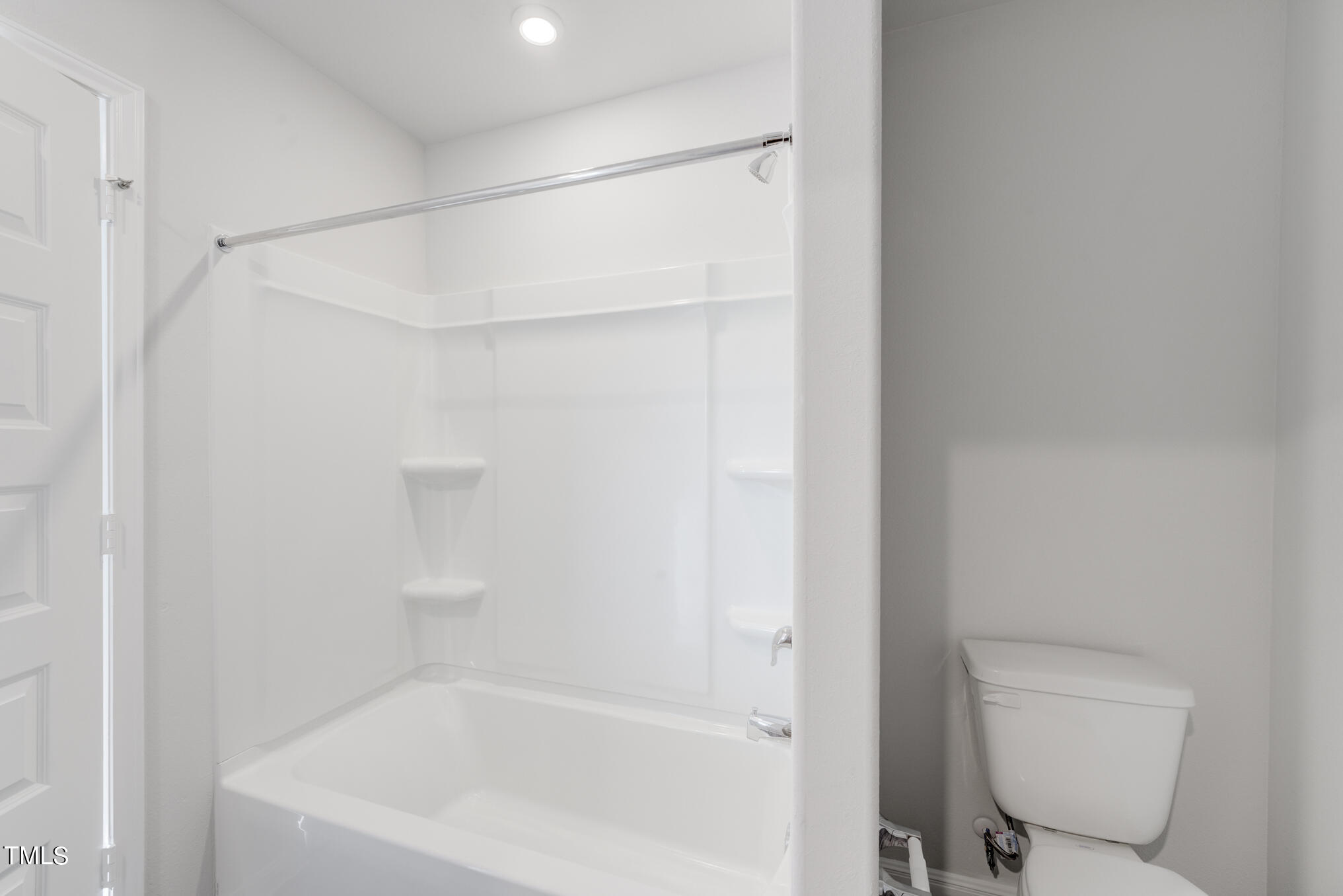 48 Andrea Court Roxboro, NC 27573 - Photo 35 of 36 a bathroom with a bathtub and a toilet
