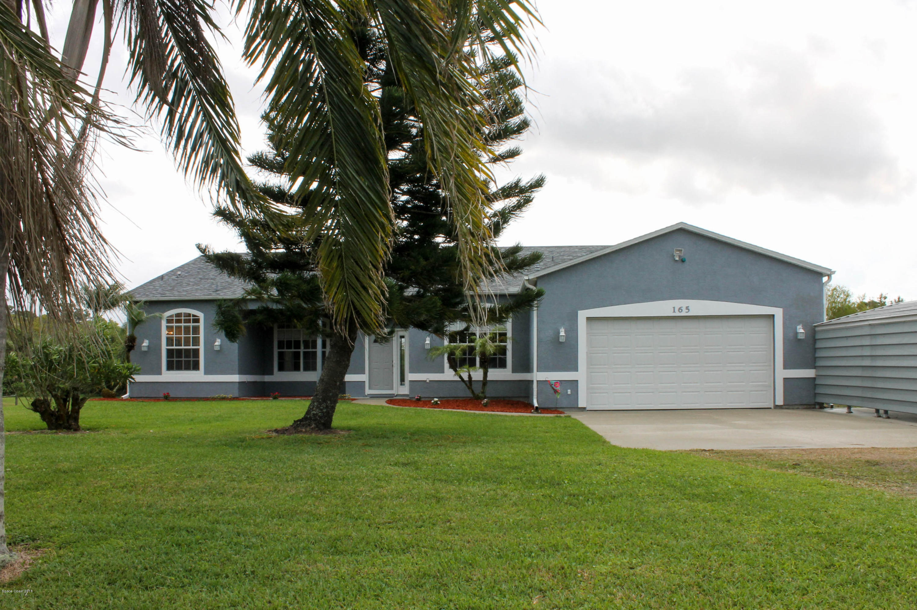 165 East Hall Road Merritt Island, FL 32953 - Photo 1 of 31 Front