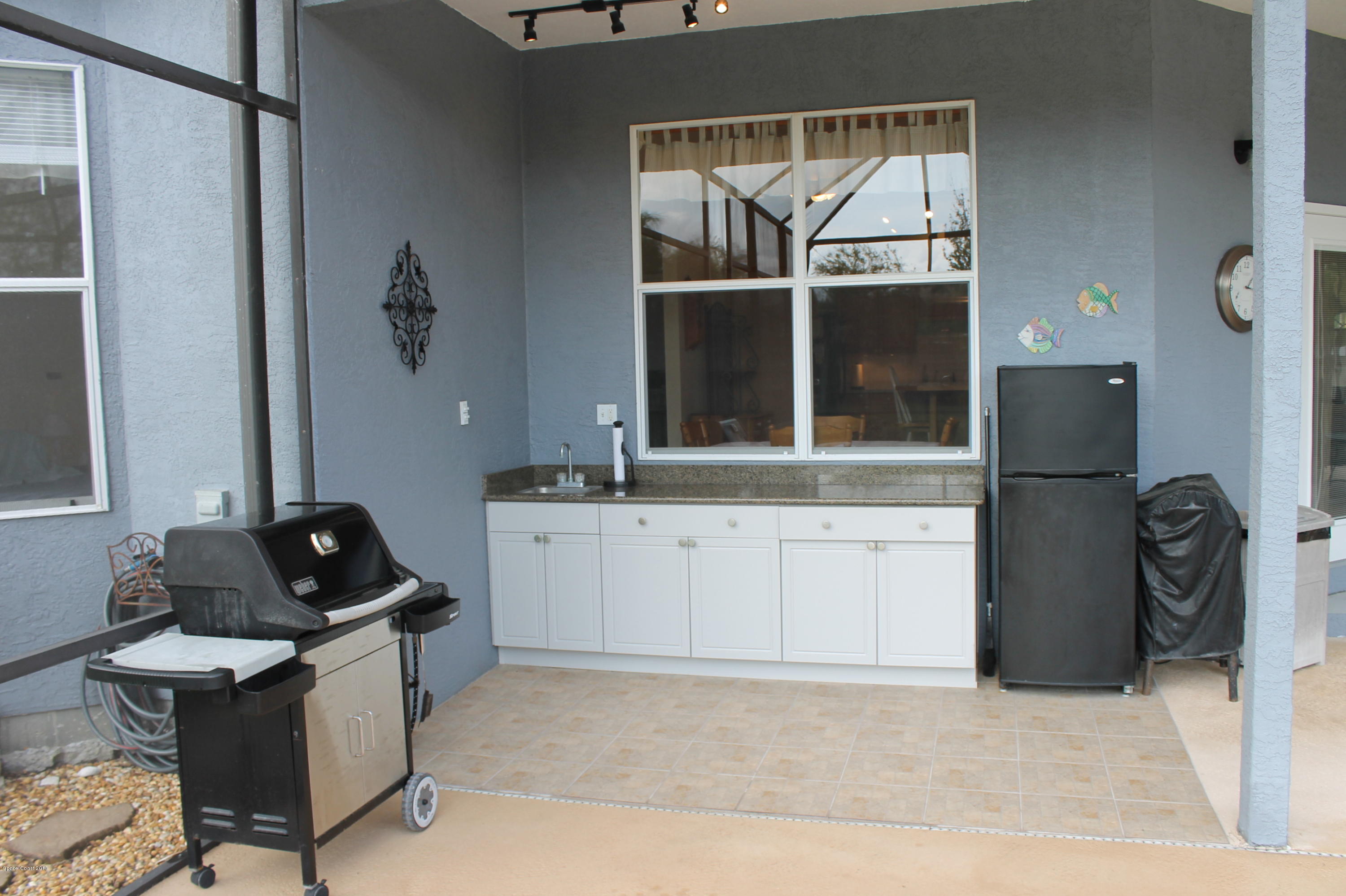165 East Hall Road Merritt Island, FL 32953 - Photo 27 of 31 Summer Kitchen