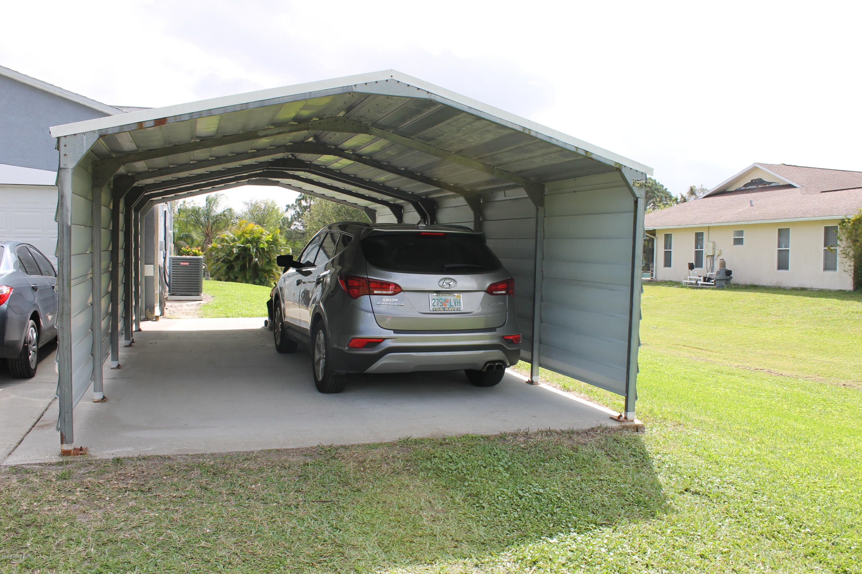 165 East Hall Road Merritt Island, FL 32953 - Photo 31 of 31 Additional Covered Parking