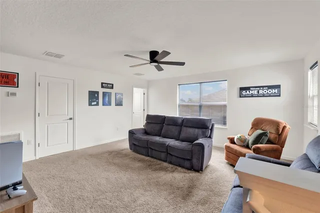 a vase with flowers sitting on a table