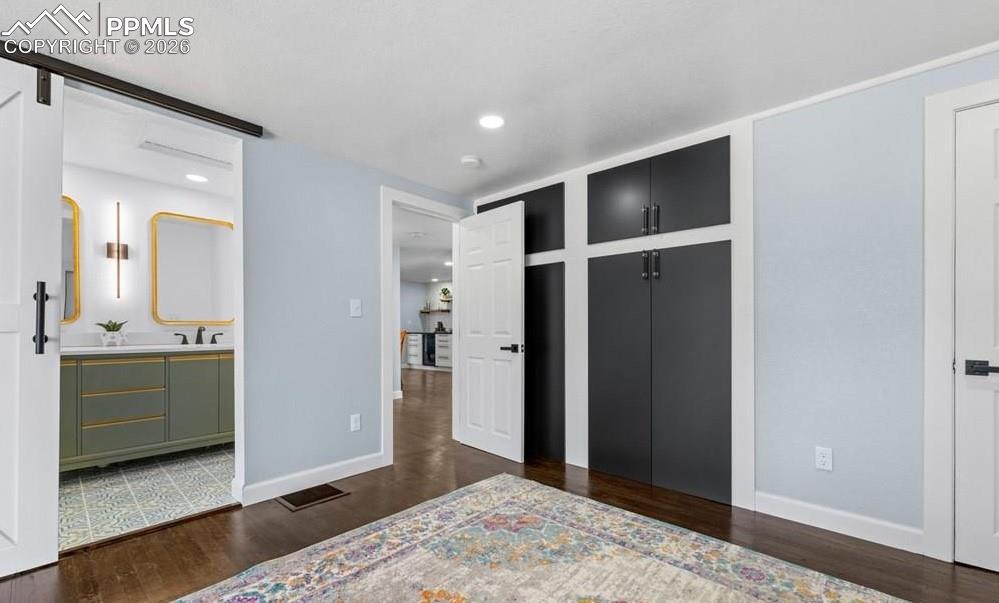 29767 Preston Road Pueblo, CO 81006 - Photo 25 of 50 a view of a bathroom with sink and mirror