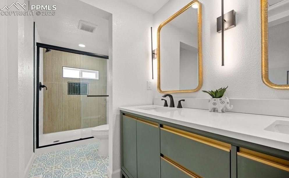 29767 Preston Road Pueblo, CO 81006 - Photo 26 of 50 a bathroom with a sink and a mirror
