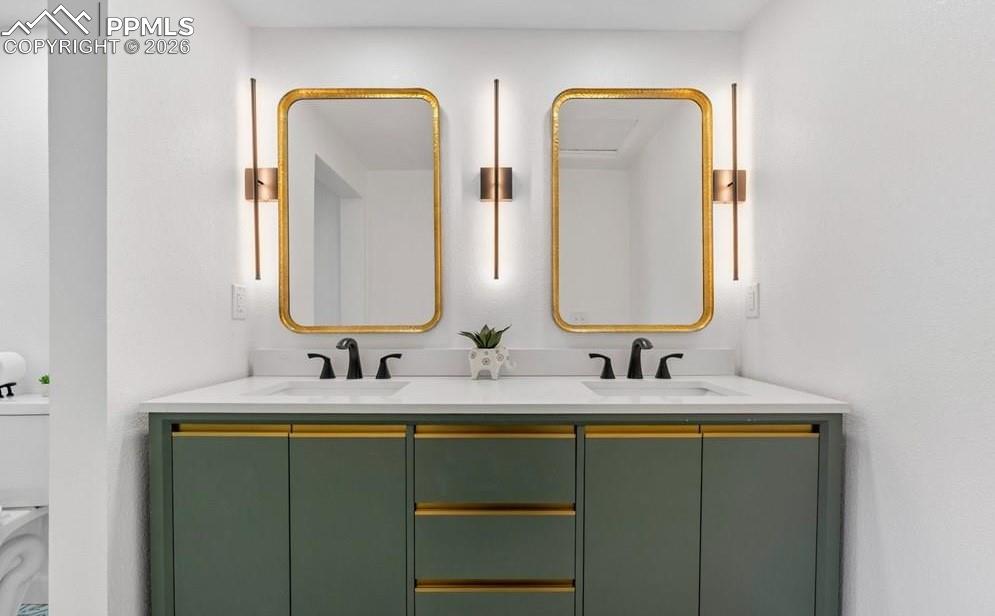 29767 Preston Road Pueblo, CO 81006 - Photo 27 of 50 a bathroom with double vanity sinks and a mirror