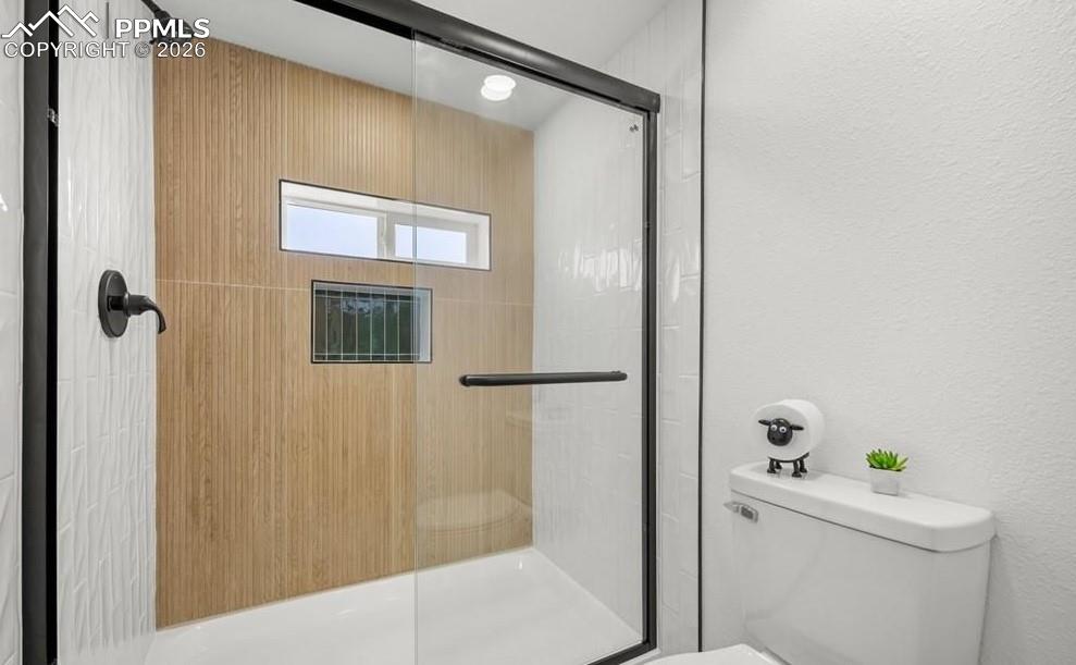 29767 Preston Road Pueblo, CO 81006 - Photo 28 of 50 a bathroom with a bathtub and shower