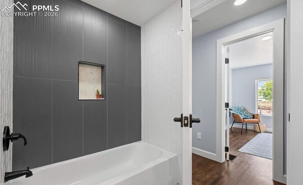 29767 Preston Road Pueblo, CO 81006 - Photo 34 of 50 a bathroom with a bathtub and a shower