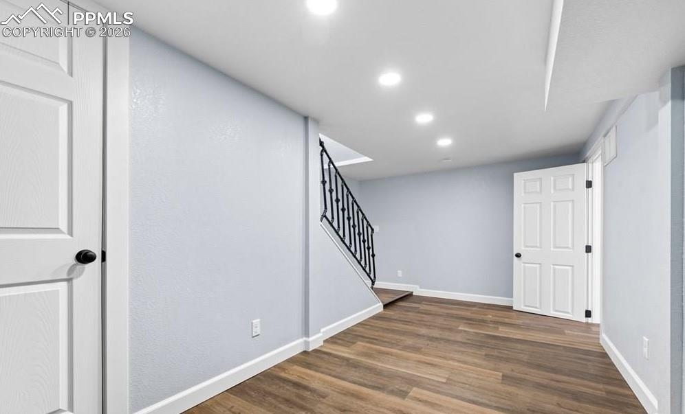 29767 Preston Road Pueblo, CO 81006 - Photo 38 of 50 a view of a hallway with wooden floor and entryway