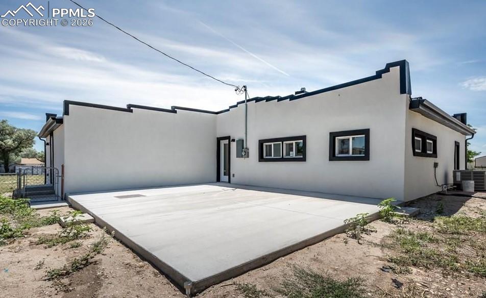 29767 Preston Road Pueblo, CO 81006 - Photo 47 of 50 a bedroom with a bed and a mirror
