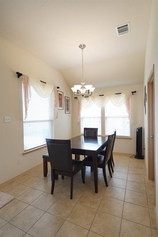 4508 Fox Rio Trail Arlington, TX 76017 - Photo 9 of 28 a view of a dining room with furniture and window