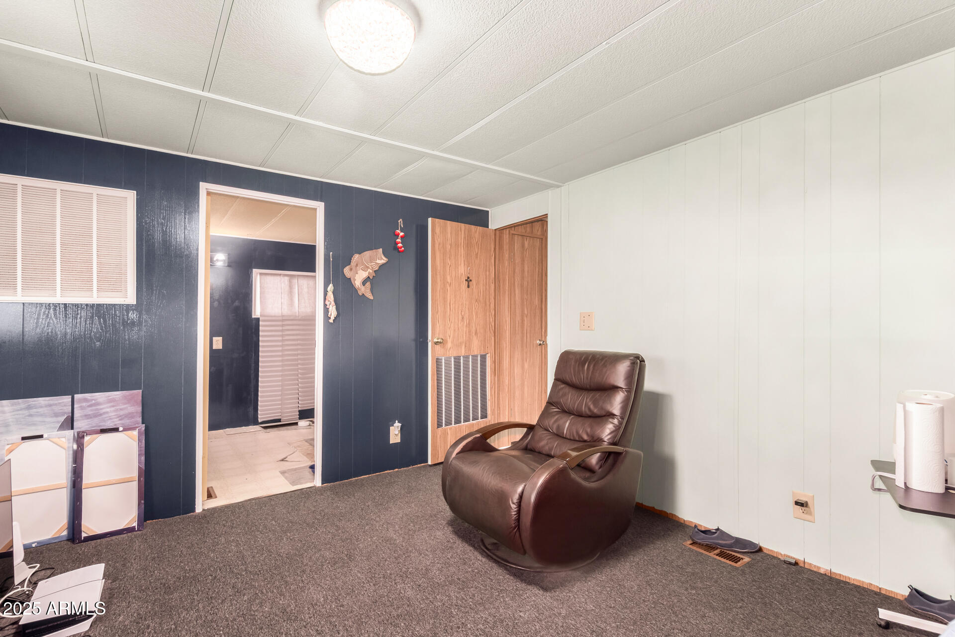 11252 East Boise Street Apache Junction, AZ 85120 - Photo 17 of 34 a room with furniture and windows