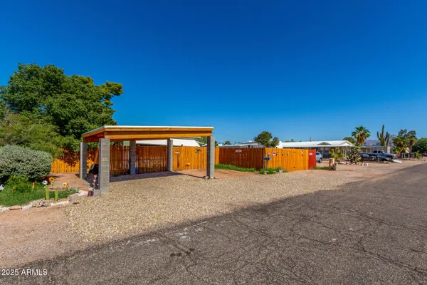a view of a house with a outdoor space and sitting area