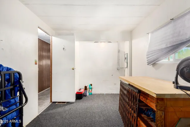 a view of a storage & utility room with closet dryer and washer