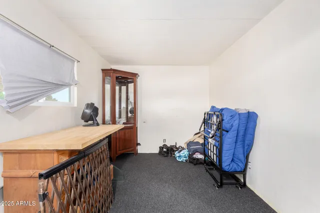 a room with furniture and window