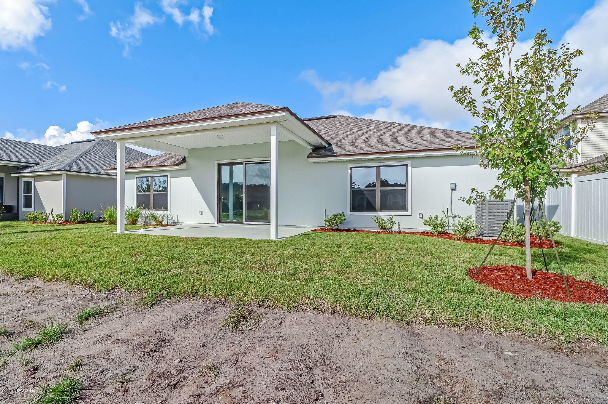 86533 Rest Haven Road, Unit 67 Yulee, FL 32097 - Photo 18 of 22 Backyard