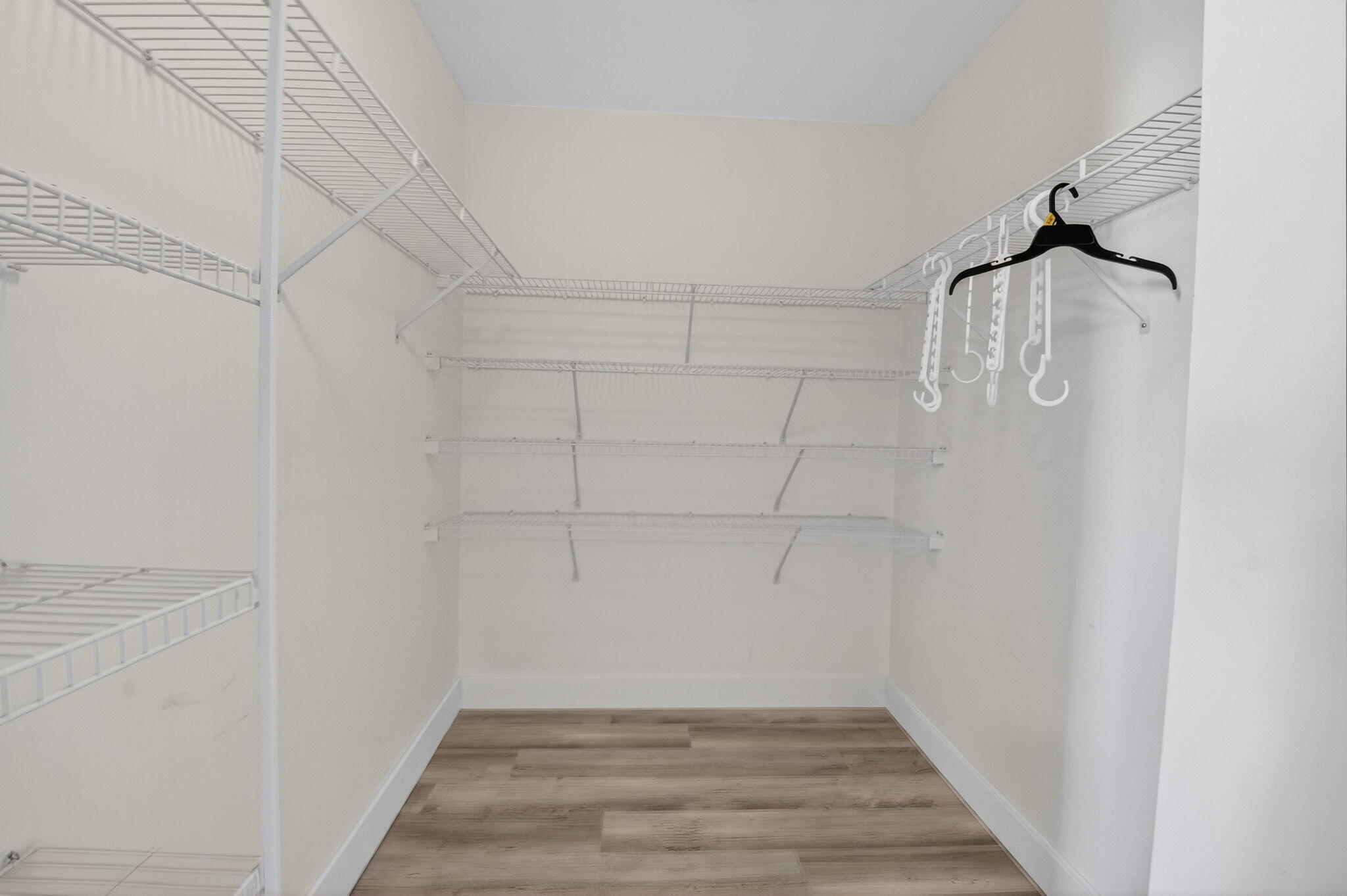 1728 Arezzo Circle Boynton Beach, FL 33436 - Photo 32 of 66 a view of a room with wooden floor