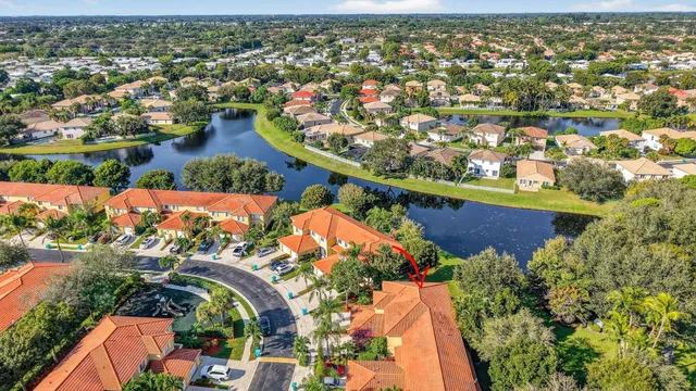a view of a golf course with a lake