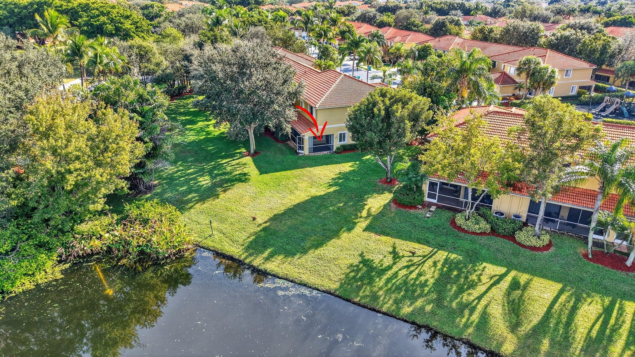 1728 Arezzo Circle Boynton Beach, FL 33436 - Photo 47 of 66 an aerial view of a house with yard swimming pool and outdoor seating
