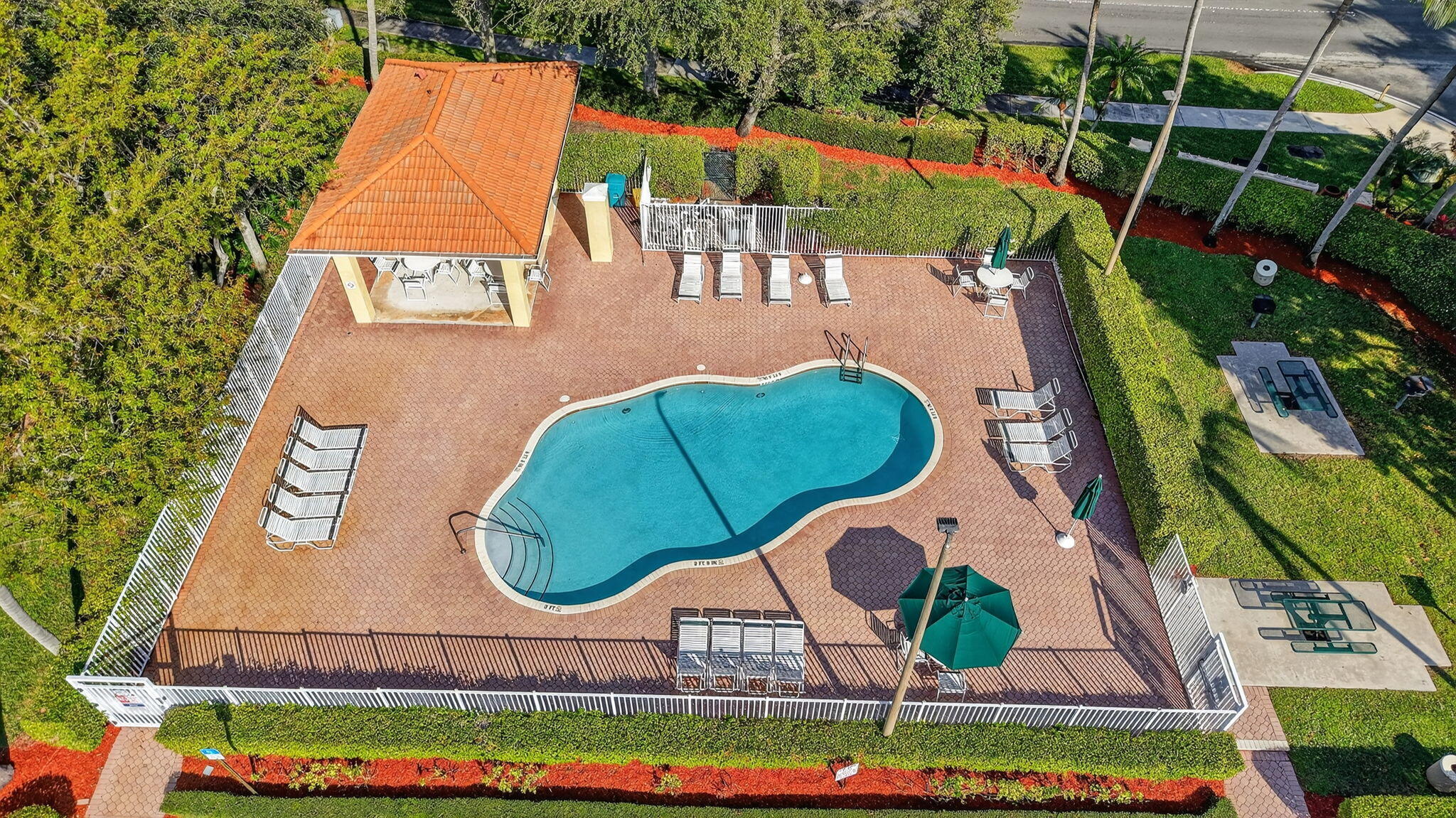 1728 Arezzo Circle Boynton Beach, FL 33436 - Photo 50 of 66 an aerial view of a swimming pool a yard and outdoor seating