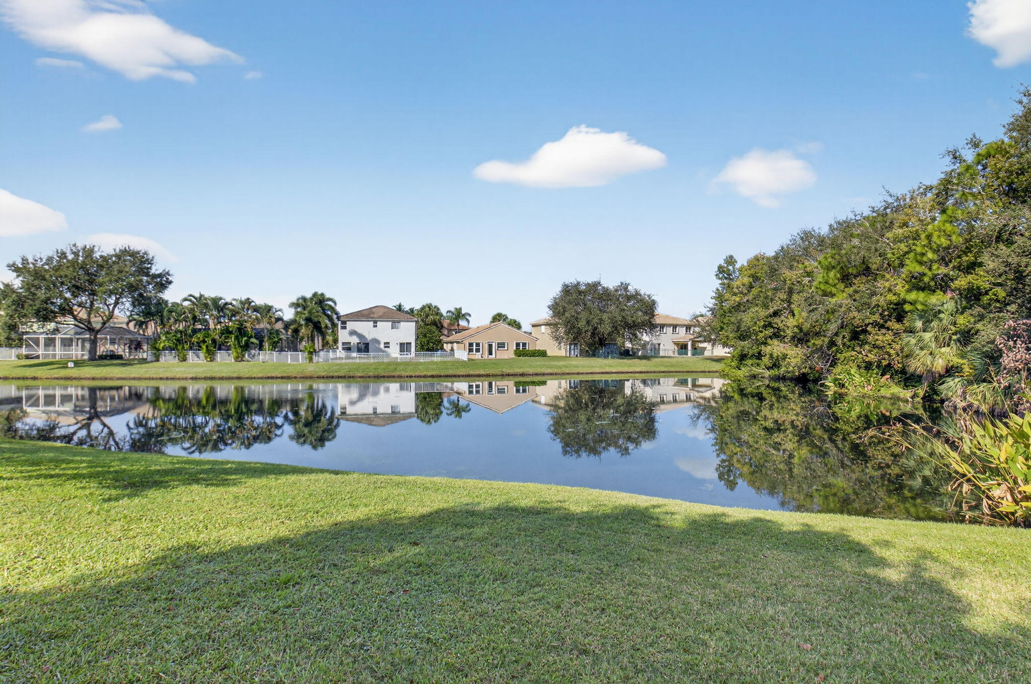 1728 Arezzo Circle Boynton Beach, FL 33436 - Photo 57 of 66 a view of a lake with houses